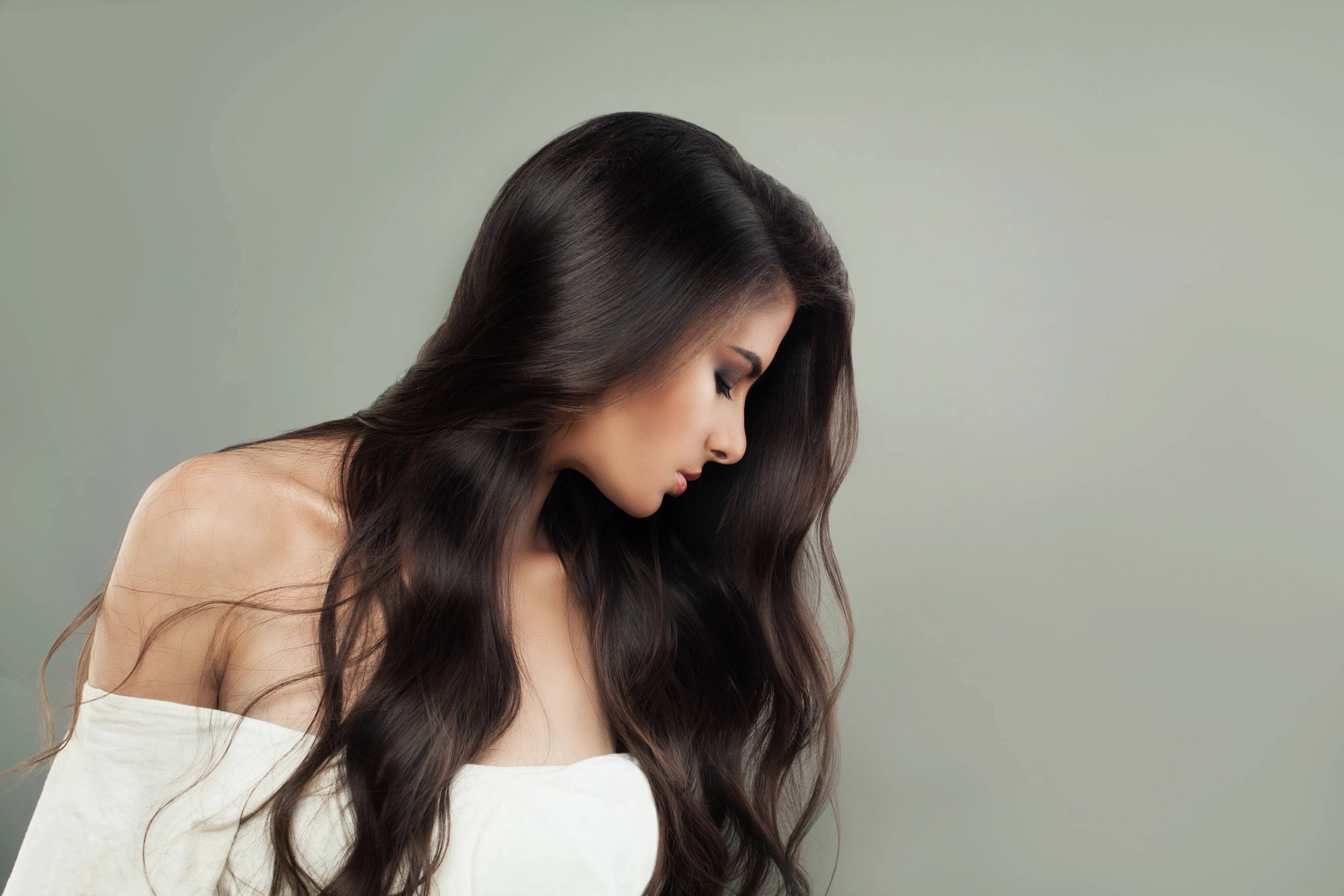 Lange, glänzende braune Haare – Raible.Studio